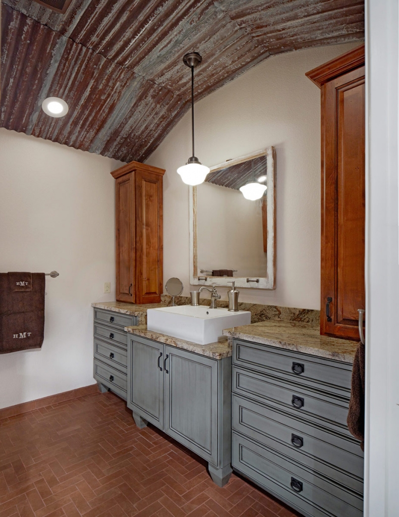 Samuels and Graf even salvaged a portion of the corrugated metal roof from the barn and installed this into the Mulkeys’ son’s bathroom.